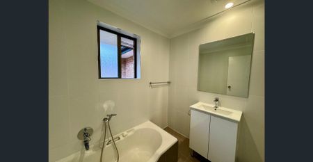 Upgraded Top Floor Apartment with Balcony & LUG! - Photo 2