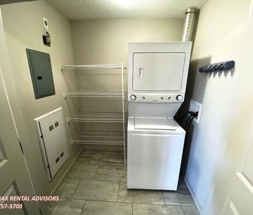 SPACIOUS 2 BED, 2 BATH TOP FLOOR APARTMENT WITH 2 U/G PARKING STALL... - Photo 2