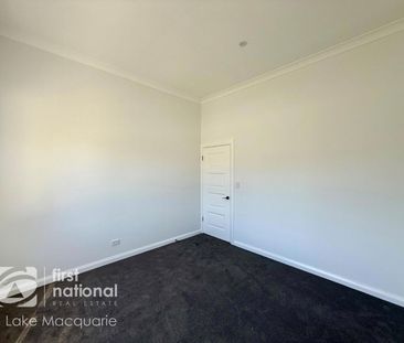 RENOVATED 2 BEDROOM UNIT - LAWN MAINTENANCE INCLUDED - Photo 2