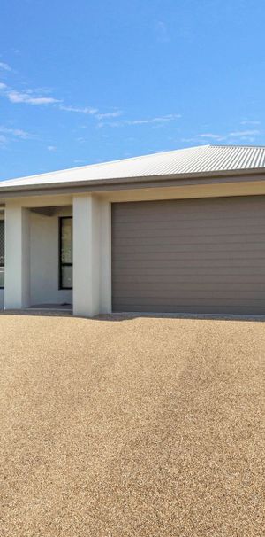 3 Bedroom Home with Spacious Yard and Double Garage - Photo 1