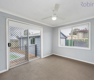 Spacious Family Home with Pool, Double Shed & Ample Parking - Photo 4
