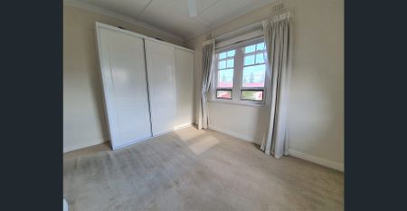 One Bedroom Upstairs Apartment Oozing Charm and Style - Photo 2