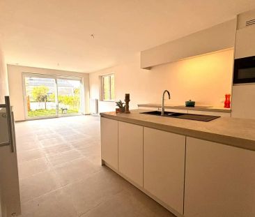 Gelijkvloers éénslaapkamerappartement met tuin en ruime garage - Foto 4