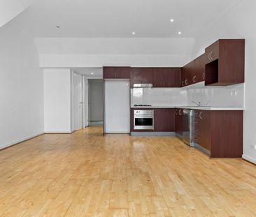 Modern One-Bedroom Apartment with Private Courtyards in the Heart o... - Photo 3