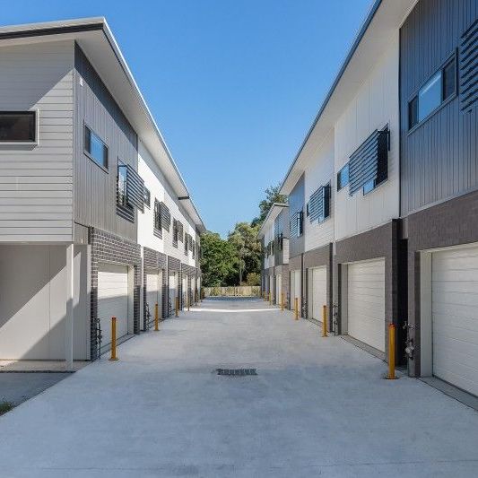 Create LBe quick to secure this near new 4 bedroom townhouse situated in a quiet complex, close to public transport & amenities.isting - Photo 1