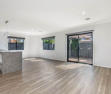 Modern & Comfortable Three-Bedroom Home with Easy Living Appeal - Photo 1