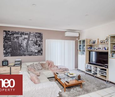 Benowa Beauty - Great Family Home in Central Location - Photo 1