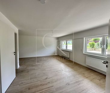 Erstbezug nach Modernisierung: Souterrain-Wohnung (1 ZKB) mit Stell... - Foto 1