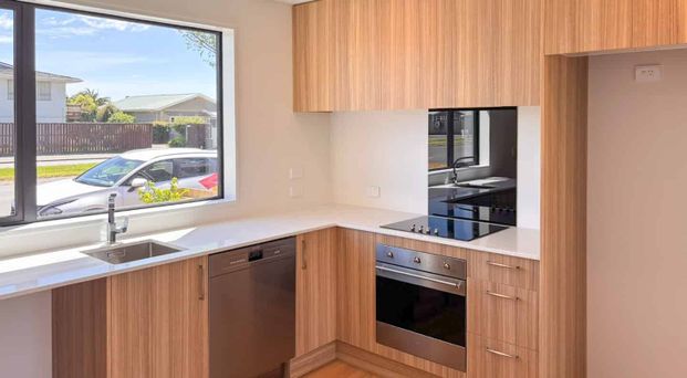 Fresh Build Two Bedroom Townhouse! - Photo 1