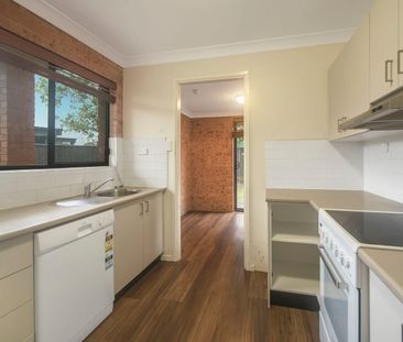Comfortable Two-Bedroom Unit in Convenient Location - Photo 4