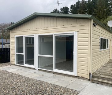 This near new, two bedroom home is tucked down a long driveway, sur... - Photo 3