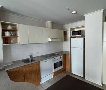 Cozy 1-Bedroom Studio with Covered Garage parking - Photo 5