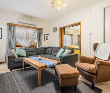 Comfortable two-bedroom unit in a convenient New Town location - Photo 1