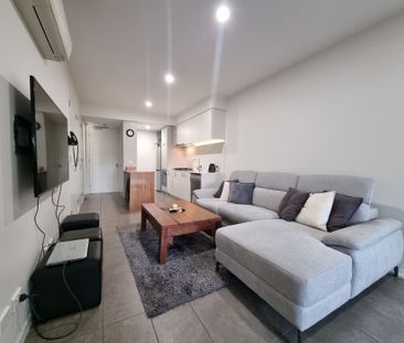 Partly Furnished Immaculate Apartment - Photo 2