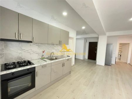 NOVISIMO-IMOBILIARE: APARTAMENTU CU DOUA CAM. IN ZONA 9 MAI - Fotografie 3