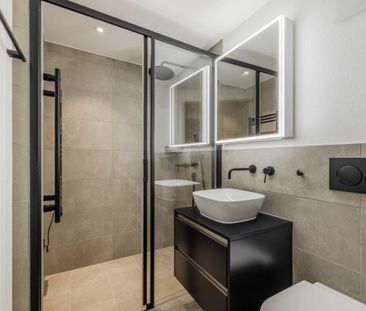 NEW CONSTRUCTION: Completely renovated 2.5-room apartment with balcony - Photo 5