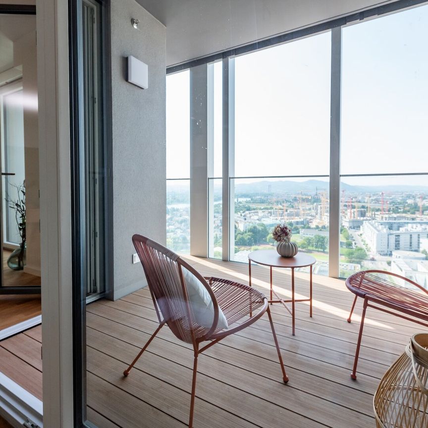 Wohnen mit Skyline-Flair – Rooftop Pool & Fitness bei der U1 - Photo 1