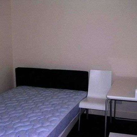 Furnished 2-Bedroom Apartment in Prime Melbourne CBD Location - Photo 3