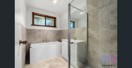 FRESHLY UPDATED FAMILY HOME IN A GREAT LOCATION - Photo 2