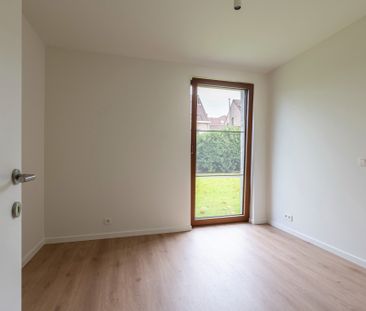 Te huur: modern nieuwbouwappartement in het centrum van Hoogstraten. - Photo 1