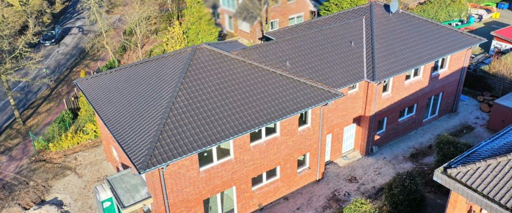 Moderne Oberwohnung mit optimaler Raumaufteilung, einer Einbauküche und Balkon im Herzen von Remels - Foto 1