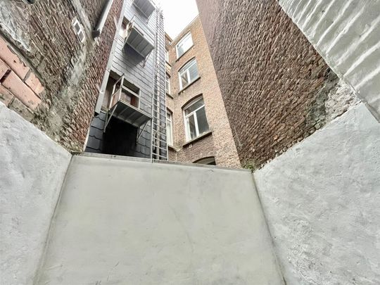 Gelijkvloers 1-slaapkamer appartement met stadskoer op topligging te Zurenborg! - Photo 1
