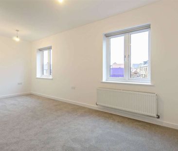 A four bedroom detached family home with a garage and garden - Photo 2