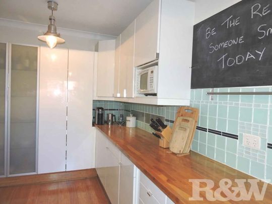 SPACIOUS TWO BEDROOM UNIT WITH COURTYARD - Photo 1
