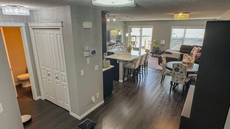 Stylish Auburn Bay Duplex With Garage & Newly Finished Basement - Photo 3