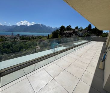 APPARTEMENT DE 2,5 PIÈCES EN ATTIQUE AVEC VUE PANORAMIQUE SUR LE LAC - Photo 2