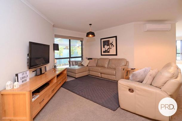 WELL APPOINTED THREE BEDROOM HOME IN PRIME LOCATION! - Photo 1