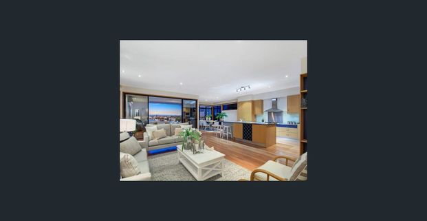 Generous family home offering extensive bay views - Photo 1