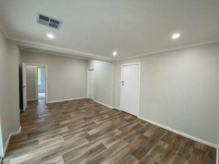“Renovated Family Home Awaiting New Tenants” - Photo 2