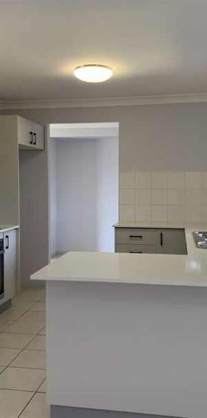 Very Comfortable & Renovated Low-set Family Home with Solar Panels - Photo 1