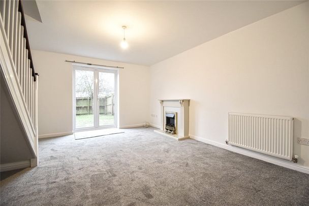 Well presented 2 bedroom terraced house situated within walking distance of the Town Centre. GCH. Garage and drvieway parking. Unfurnished. - Photo 1