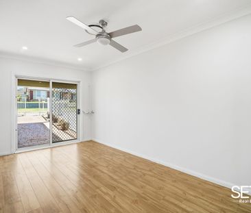 Perfect Family Home with Ducted Air Conditioning - Photo 2