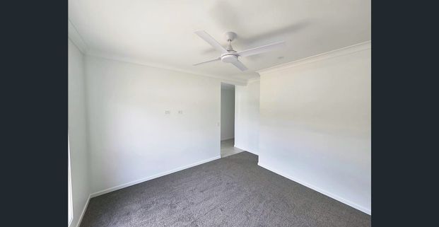 Brand New 4-Bedroom Home Opposite Central Springs Park - Photo 1