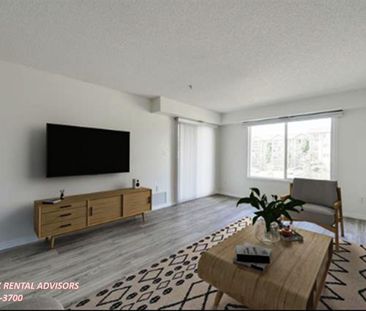 GREAT 2 BED, 1 BATH APARTMENT WITH OUTDOOR PARKING STALL IN THE COM... - Photo 3