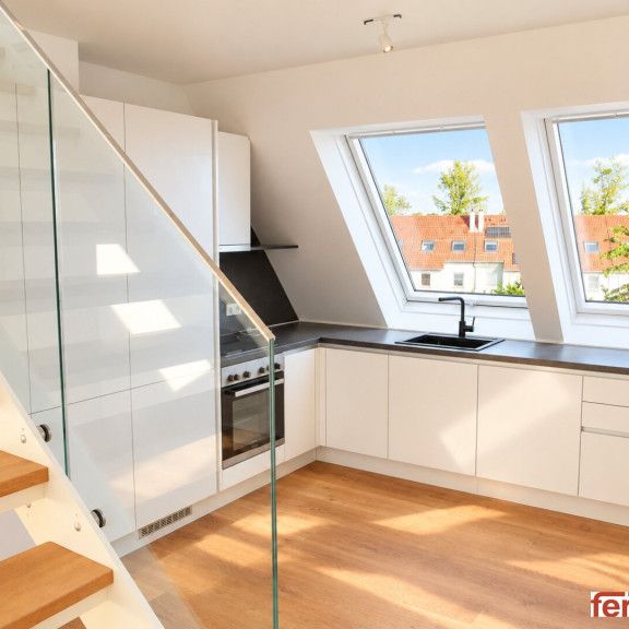 Moderne 3-Zi-Dachgeschosswohnung mit Rundumblick-Terrasse, Klimaanlage & Tiefgarage in Leopoldsdorf! - Foto 1