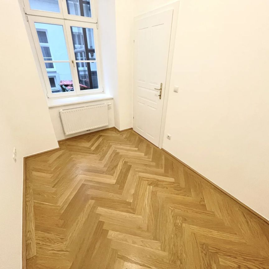 Stilvoll sanierte Altbauwohnung in bester Innenstadtlage – Ruheoase am Getreidemarkt - Photo 1