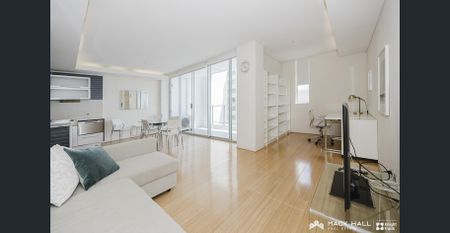 Fully furnished contemporary Living at Condor Towers - Photo 2