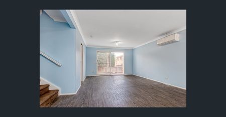 CONVENIENTLY LOCATED TOWNHOUSE - Photo 4