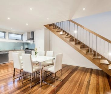 Industrial-Style Warehouse Living with Private Rooftop Terrace - Photo 1