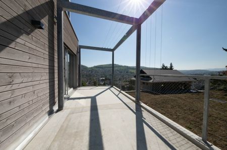 Moderne 2.5-Zimmer-Wohnung mit Holzboden und ländlicher Aussicht - Photo 2