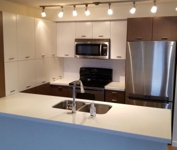 Bright 2 bed + den, 2 bath @ MODE - Photo 4