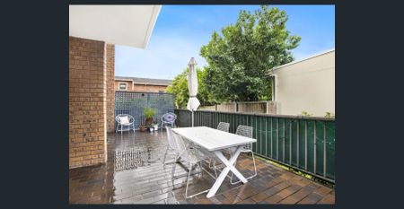 Quietly positioned at rear, bright 1 bedder with huge patio - Photo 3