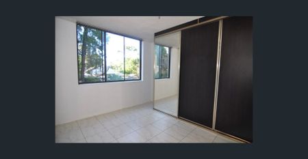 Two bedroom unit with parking - Photo 3