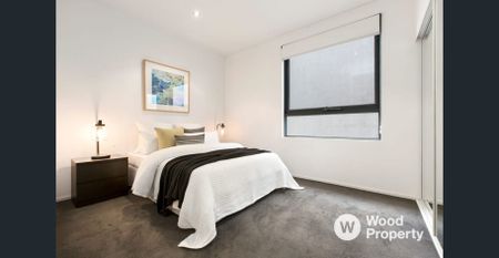 Modern 2-Bed, 2-Bath Apartment with Balcony & Prime Melbourne Location - Photo 3
