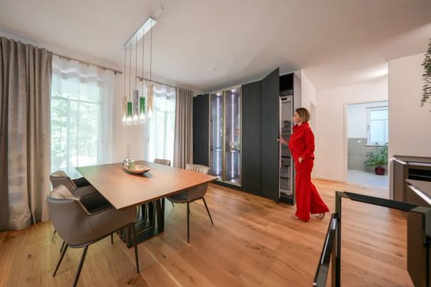 Traumhafte Neubauwohnung im Souterrain mit großem eigenen Garten - Photo 1