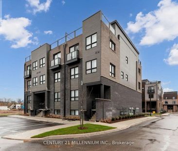 102 - 6705 CROPP STREET E — 2 Bedroom - Photo 1